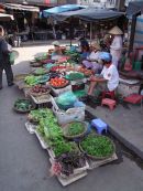 Greengrocer outside Hoi An Market