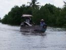 Small Boat Underway on the Mekong Delta