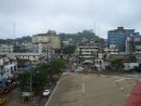 Abandoned Ducor Intercontinental Hotel on hill in background, Monrovia, Liberia