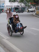 Vietnamese Man Driving a Cyclo