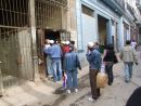 Cubans queing at a shop, Havana