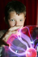 A child experiments with a vandergraph generator as part of a Careers Scotland workshop