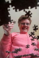 Photographed for a social service brochure illusrating case studies in this example the lady had a passion for jigsaws
