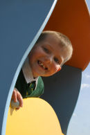 Child in play area Irvine taken for North Ayrshire Council to publicise new community centre