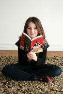 Young girl who was 400th member of Millport library. Taken for North Ayrshire Council