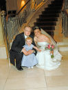 Couple with flower girl
