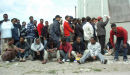 Refugee's and asylum seekers line up in Calais to get to England