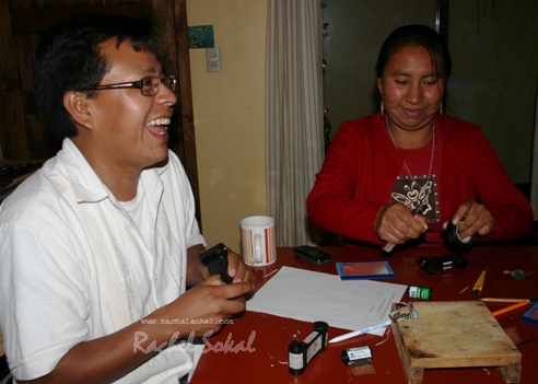 Xuno Lopez Intzin and Antonia Santiz Giron, both Tzeltal speaking photographers originally from Tenejapa, laughing (probably at my terrible Tzeltal!) whilst making their matchbox cameras. 30.3.10