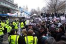 Police protecting Tony Blair from the angry British public
