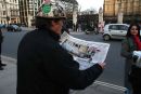Brian Haw reading the newpaper