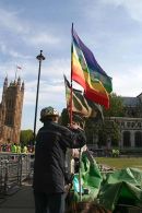 Brian Haw holds the flag of peace