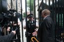 Chris Coverdale explains to police that Tony Blair should be arrested for offences related to genocide