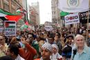 Demonstrators get as close as they can to the Israeli Embassy