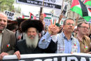 Hochhauser Orthodox Jew marches hand in hand with Dr. Mustafa Barghouthi Secretary General MP Palestinian National Initiative for peace.