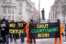 "No To Torture"  "Shut Guantánamo Now"
