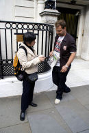 Paul Hilder, Campaign Director AVAAZ, talking to the Chinese media about the Dalai-China handshake