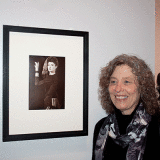 Stephanie Browner next to Man Ray's portrait of "Juliet"